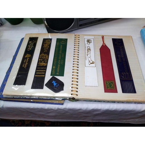 346 - Three folders of leather, card and plastic bookmarks