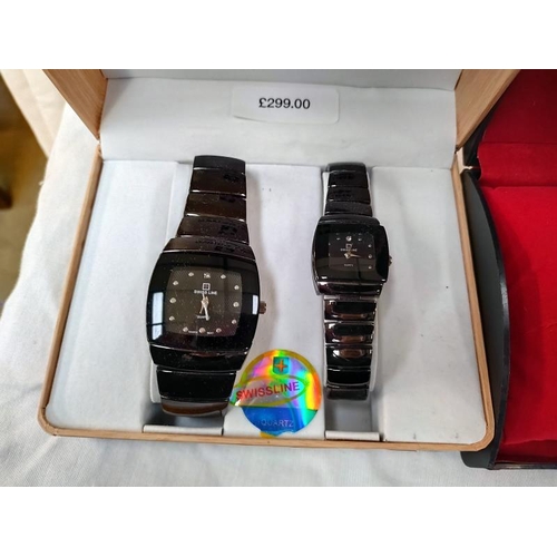 1121 - A boxed Swiss line wrist watch and Orlando watch.