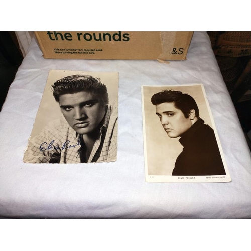 1134 - A collection of 17 Elvis mini singles sleeves, Elvis pictures etc.