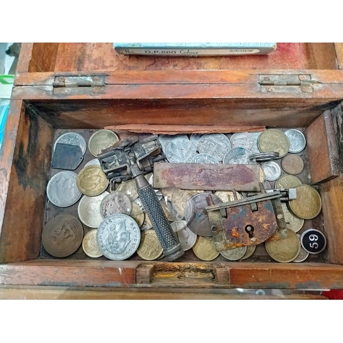 1169 - An old wooden box of old mainly foreign coins