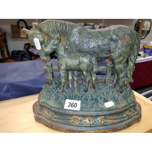 360 - Two large cast iron doorstops of a pair of horses and a cockerel.  COLLECT ONLY.