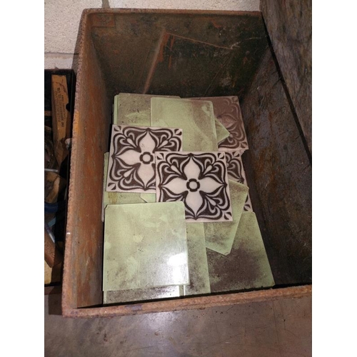 372 - An old iron deed box and quantity of glazed tiles.  COLLECT ONLY.