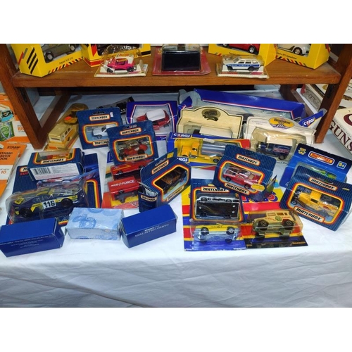 1208 - A large quantity of 1980/90's boxed Matchbox Corgi etc