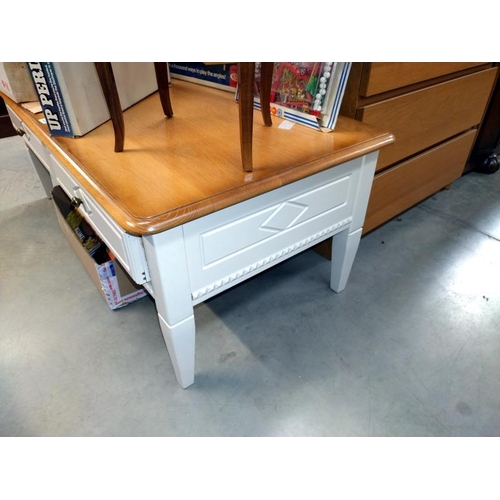 1269 - A large modern oak coffee table with painted base and polished top. 125cm x 65cm x height 49cm. COLL... 