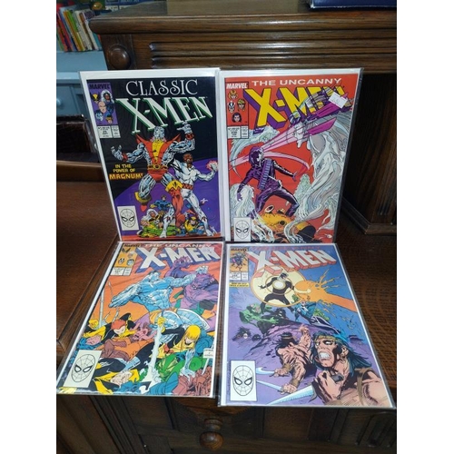 1276 - A collection of Spider-man and X-Men comics. 22comics.