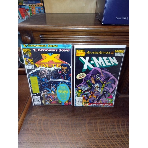 1276 - A collection of Spider-man and X-Men comics. 22comics.