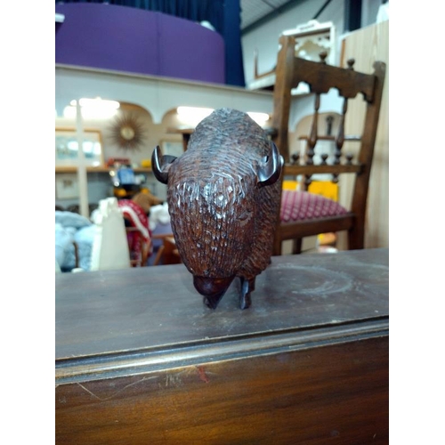 1311 - A carved wooden Bison Length 25cm. COLLECT ONLY.