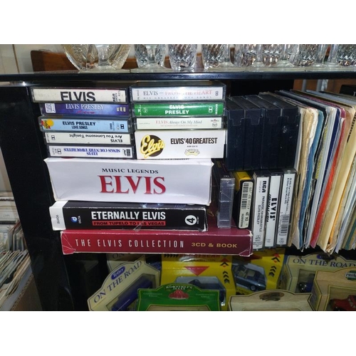 1254 - A large quantity of Elvis memorabilia including 45