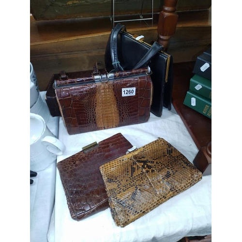 1260 - A quantity of crocodile and snakeskin handbags, leather early-mid 20th century.