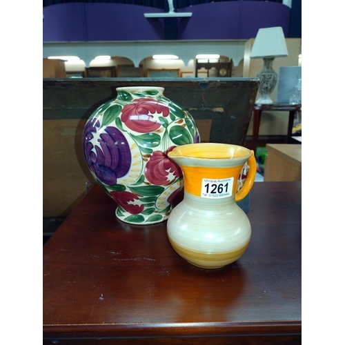 1261 - An art deco Shelley jug, burnt orange with a Wade Harvest vase.