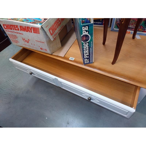 1269 - A large modern oak coffee table with painted base and polished top. 125cm x 65cm x height 49cm. COLL... 