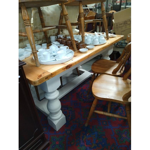 1295 - A rustic pine refrectory style kitchen table with painted legs. 96cm x 153cm x height 78cm.  COLLECT... 