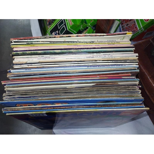 1323 - Approximately 60 LP records, mainly 1970's including top of the pops, etc