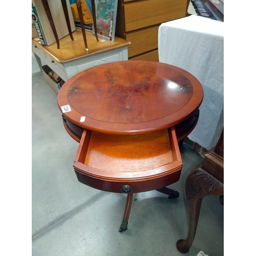 1324 - A mahogany drum top wine/tea table with two drawers. 51cm x 56cm.  COLLECT ONLY.