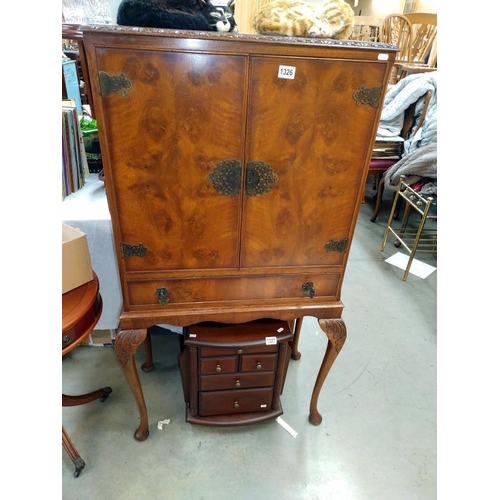 1326 - A walnut cocktail cabinet on Queen Anne legs.  COLLECT ONLY.