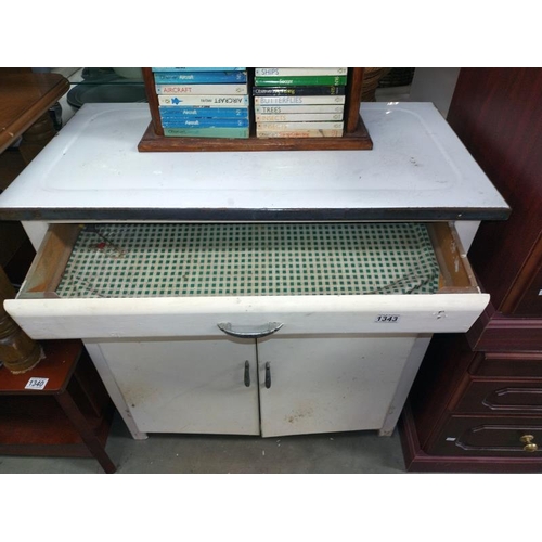 1343 - An enamel top kitchen cupboard. 81cm x 33xm x height 83cm. COLLECT ONLY.