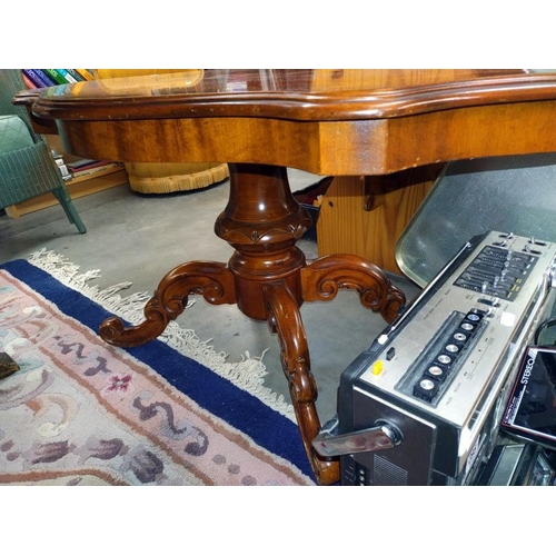 394 - An inlaid dark wood coffee table. 100cm x 63cm x Height 53cm. COLLECT ONLY.