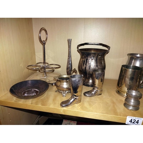 424 - A shelf of silver/ pewter plated items