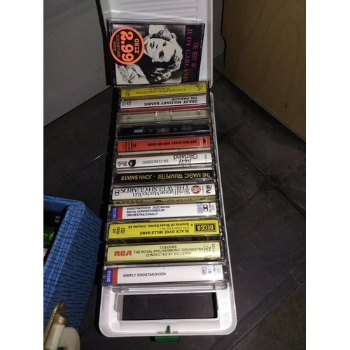 431 - A Brexton case of cassette tapes and one other.