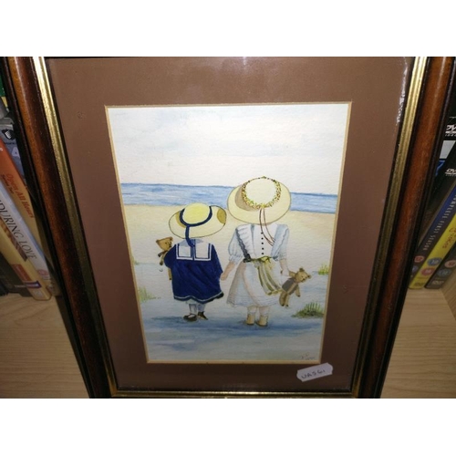 435 - A set of three framed and glazed beach prints.