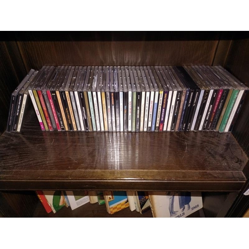 438 - Three shelves of approximately 250 CD's.