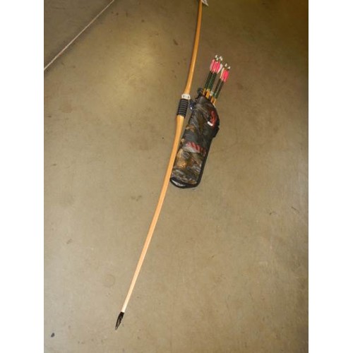 2564 - An English laminated longbow, 38lb at 28