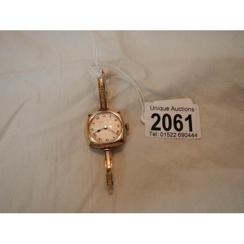 2061 - A yellow metal ladies wrist watch by J Hargreaves?, Liverpool.