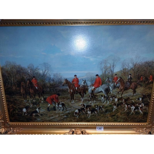 1387 - A large gilt framed varnished print on canvas of An Autumn meeting, hunt scene by Heywood Harvey.91c... 