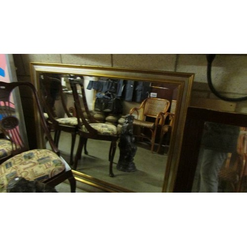 2569 - A large framed bevel edged mirror, COLLECT ONLY.