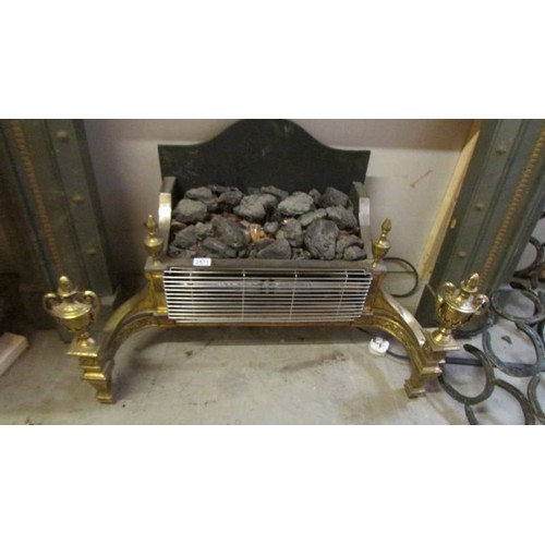 2571 - A coal effect electric fire with brass surround. COLLECT ONLY.