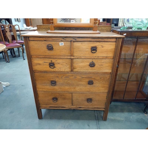 1408 - An Edwardian oak seven drawer chest with iron handles. 95cm x 45cm x height 110cm. COLLECT ONLY