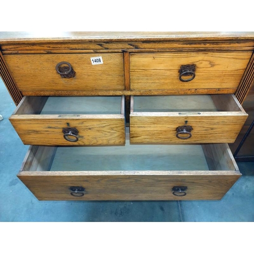 1408 - An Edwardian oak seven drawer chest with iron handles. 95cm x 45cm x height 110cm. COLLECT ONLY