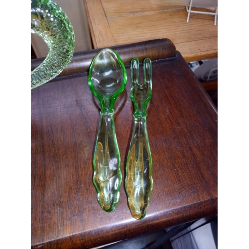 1409 - A large Art Deco green glass serving bowl with servers.