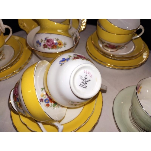 1417 - A vintage Staffordshire Chelsea tea set and four paragon floral cups and saucers