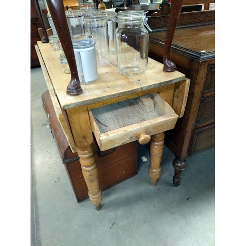 1429 - A Victorian pine drop leaf table A/F. 105 cm x 48cm x height 75cm. COLLECT ONLY.