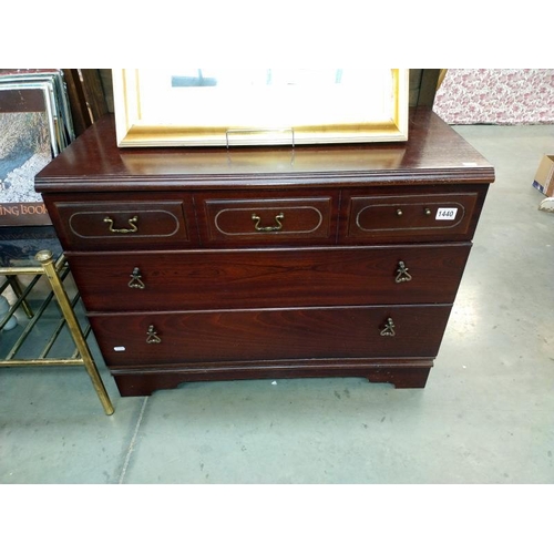 1440 - A Merridew dark wood three drawer chest of drawers. 87cm x 43cm x Height 66cm. COLLECT ONLY.