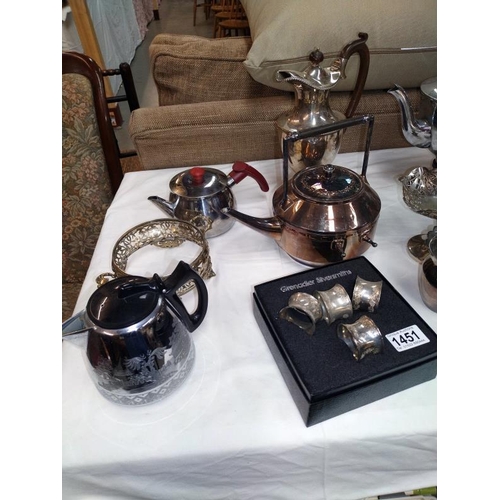 1451 - A selection of silver plated ware including teapots, bowls and napkin rings etc.