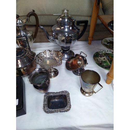 1451 - A selection of silver plated ware including teapots, bowls and napkin rings etc.