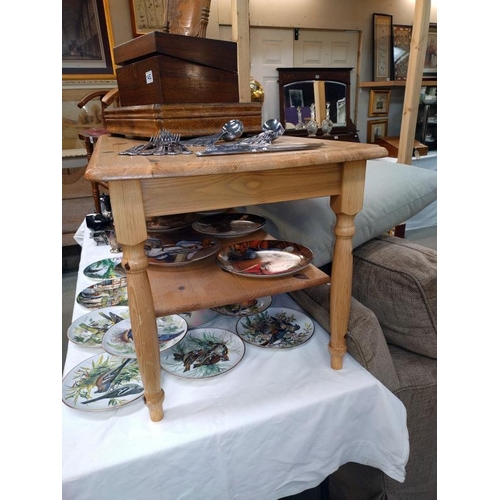 1453 - A solid pine coffee table with magazine shelf. 99cm x 49cm x height 47cm. COLLECT ONLY.