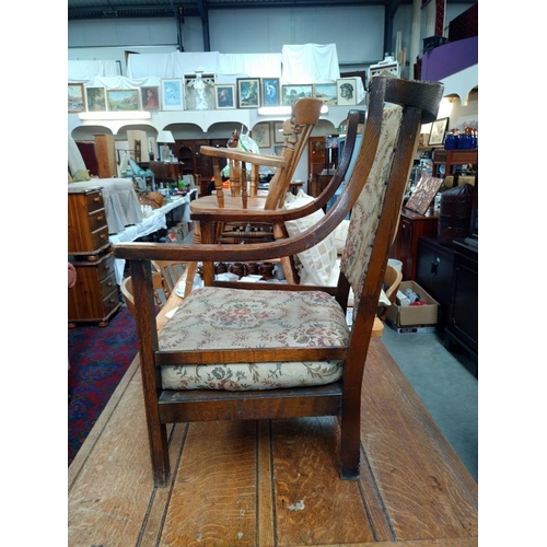 1466 - A 1930's oak arm chair with tapestry seat. COLLECT ONLY.