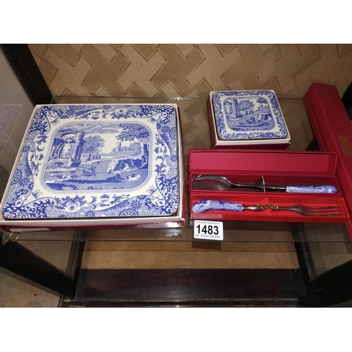 1483 - A boxed Spode blue and white handle cutlery and place mats.