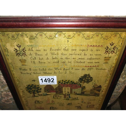 1492 - A framed print of a 19th Century sampler. 33cm x 14.5cm. COLLECT ONLY.