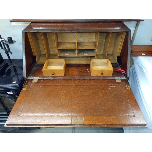 1508 - A 1930's oak bureau. 74cm x 41cm x 101cm. COLLECT ONLY.