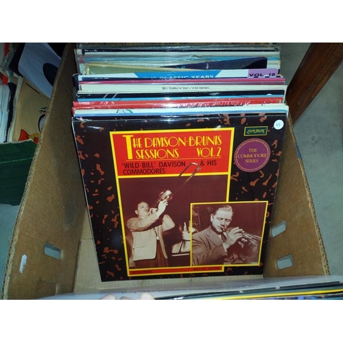 1516 - A collection of LP records, a box of singles & a quantity of CD's