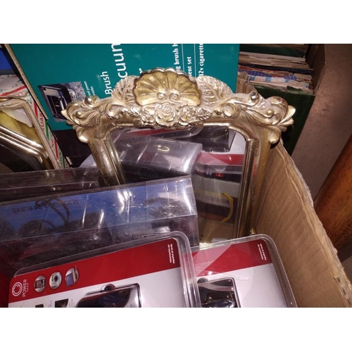 1523 - A box of household goods including clock, mirror small vacuum cleaner etc,