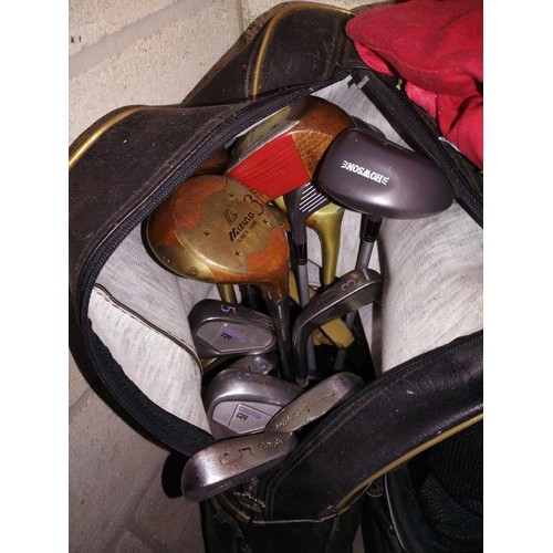 363 - A quantity of golf clubs, bags and shoes.  COLLECT ONLY.