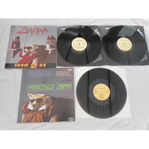 45 - 2 x Frank Zappa records Both in mint condition E 2402341 and EJ 27 0256 Mint