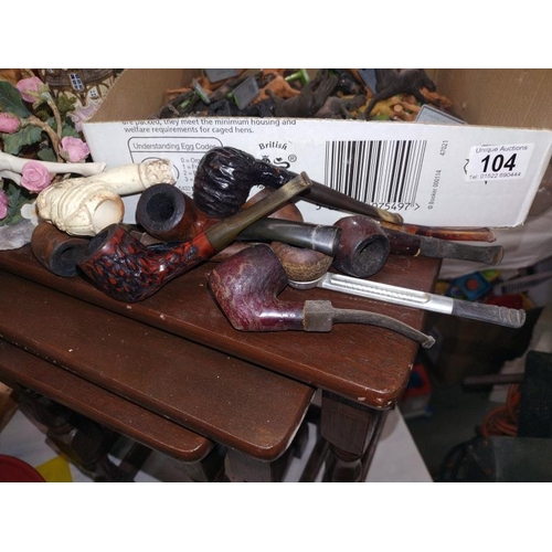 104 - A box of vintage Deetail galloping horses, the shoemaker's dream, Victoria and a selection of pipes