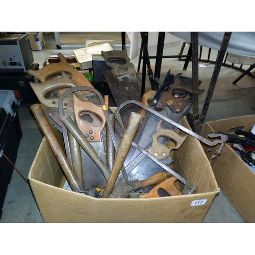 117 - A large box of various saws and hammers