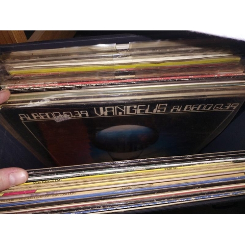 128 - A box full of progressive rock LP's including Vangelis.